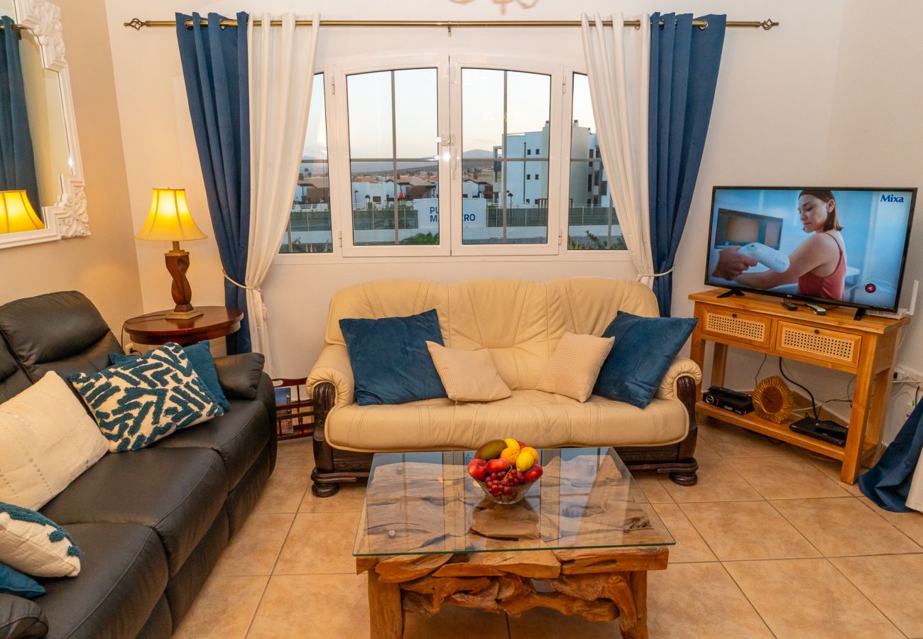 Ferienwohnung in Caleta de Fuste - Hole-In-One – Penthouse by the ocean & golf course